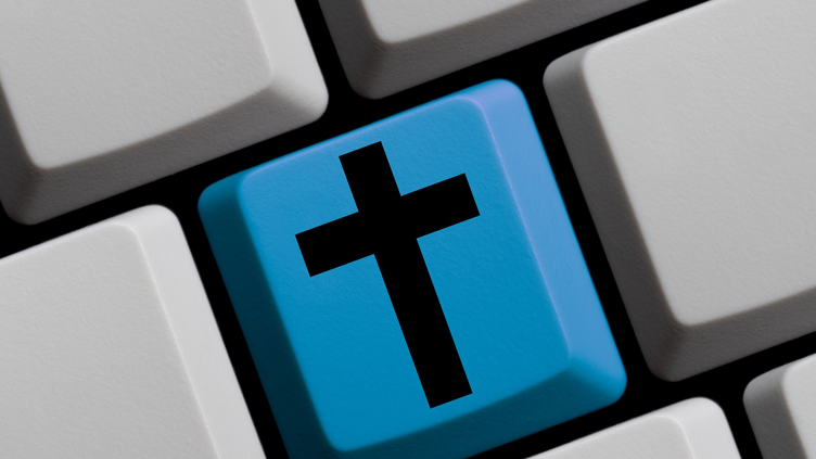 Kreuz auf Tastatur